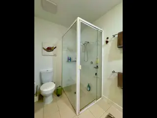 Glass shower shelf, in the frame that shows it